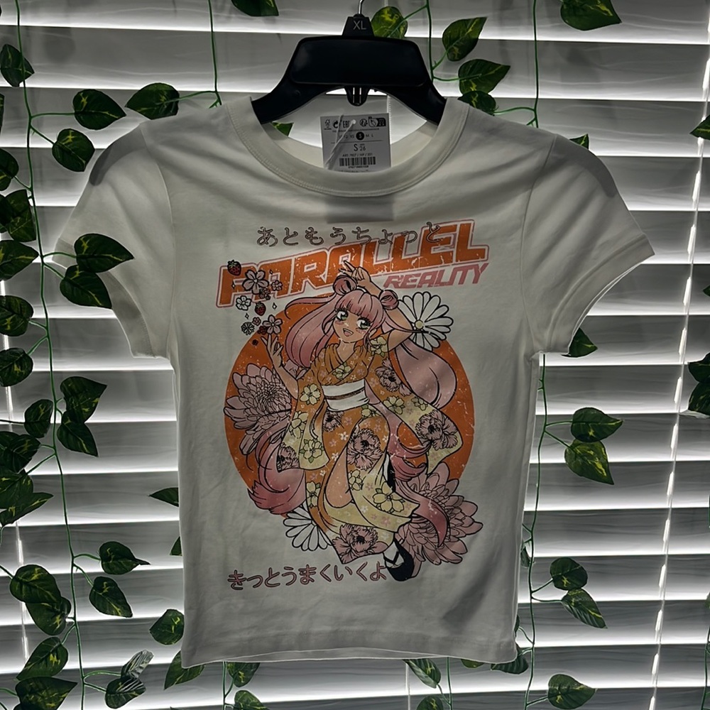 a white tee with an anime design